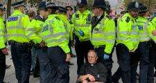 Tim Hewes climate protester about to be arrested