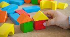 child playing with bricks