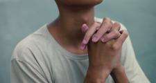 Teenager praying