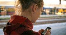 Photo by Daria Nepriakhina showing young person using mobile