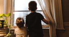 Children at window, photo by Kelly Sikkema