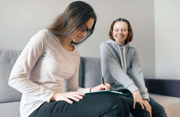 Social worker talking with user of services