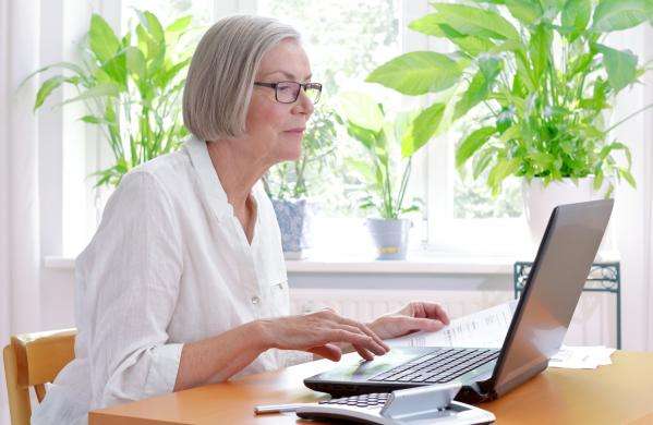 Woman filling in tax return