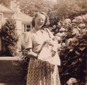 Old black and white photo of mother and child