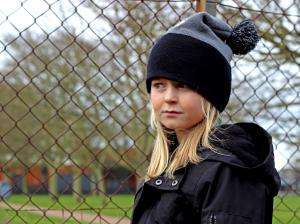 Image of young girl looking into distance